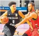  ?? Photo Photosport ?? Tall Blacks guard Tai Webster challenges the defence of Lebanon’s Elias Rustom in their tight Fiba qualifying match in Rotorua.