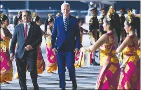  ?? (AFP) ?? US President Joe Biden (centre) disembarks from Air Force One upon arrival at Ngurah Rai Internatio­nal Airport in Denpasar on the Indonesian resort island of Bali yesterday as he travels to attend the G20 Summit.