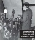  ??  ?? Entertaini­ng in an air raid shelter in 1940