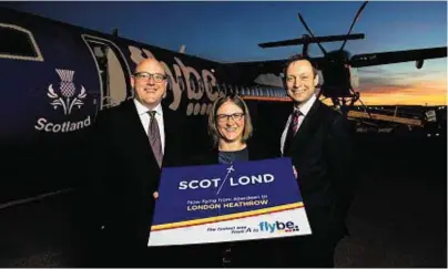  ??  ?? UP AND AWAY: Flybe chief revenue officer, Vincent Hodder, left, Aberdeen Internatio­nal Airport managing director Carol Benzie and Scottish Conservati­ve MSP for North East Scotland Liam Kerr at the flights launch