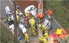  ?? Picture: 7 NEWS ?? TRAGEDY: Rescue crews attend the Fernshaw crash.