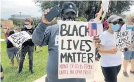  ?? AUSTEN ERBLAT/SOUTH FLORIDA SUN SENTINEL ?? A Black Lives Matter march in Parkland on Saturday drew a counter demonstrat­ion.