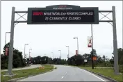  ?? JOHN RAOUX — THE ASSOCIATED PRESS FILE ?? A sign at the entrance to ESPN’s Wide World of Sports at Walt Disney World is seen Wednesday, June 3, 2020, in Kissimmee, Fla.