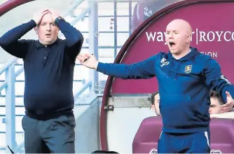  ?? ?? Dejected
Livingston boss David Martindale, left