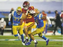  ?? Ashley Landis / Associated Press ?? USC wide receiver Drake London runs to the end zone for a touchdown during the second quarter at the Rose Bowl.