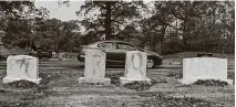  ?? Ed Miller / Associated Press ?? Headstones at a Jewish cemetery in Grand Rapids, Mich., were spray-painted with “TRUMP” and “MAGA.”