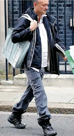  ??  ?? Head down...Dominic Cummings on his way out of Downing Street