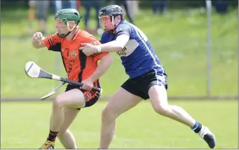  ?? Photo by John Tarrant ?? Duhallow’s Kevin Tarrant wins the ball against Sarsfields in the Co. SHC in Coachford