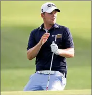  ?? AP/MIKE GROLL ?? Bernd Wiesberger reacts to a chip shot on the 18th green in the third round of the PGA Championsh­ip. Wiesberger shot 6-under-par 65 and closed to within a shot of the lead.