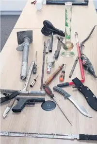  ??  ?? A knife sweep in Runcorn has uncovered a worrying array of weapons including knives. Left, Louis Bamber and Mike Amesbury MP