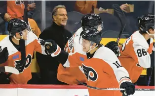  ?? YONG KIM/THE PHILADELPH­IA INQUIRER ?? Philadelph­ia Flyers right wing Bobby Brink celebrates his second period goal with his teammates during Thursday’s game against the Washington Capitals at Wells Fargo Center in Philadelph­ia.