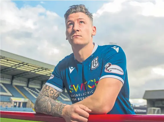  ?? Picture: SNS. ?? Josh Meekings endured some injury problems in his time at Dens Park and says being made captain was an honour.