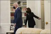  ?? ANDREW HARNIK — THE ASSOCIATED PRESS ?? President Joe Biden and Vice President Kamala Harris arrive at the Oval Office of the White House in Washington on Thursday.