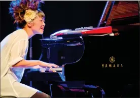  ??  ?? HIGH FIDELITY: The Trust invests in Yamaha, which makes pianos for Hiromi