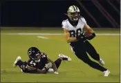  ?? JEFF HAYNES — PANINI ?? New Orleans Saints wide receiver Austin Carr (80) runs with the ball after a catch against the Chicago Bears during a game in November. The Saints and the Bears face off again on Sunday in a wild card playoff game.