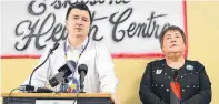  ?? CHRIS CONNORS SALTWIRE NETWORK ?? Eskasoni First Nation Chief Leroy Denny, left, addresses the media at the Eskasoni Health Centre as health director Sharon Rudderham looks on. Denny said multiple deaths have left the community grieving in recent weeks and long-term funding is urgently needed to deal with a mental health crisis.•