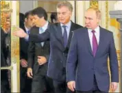  ?? REUTERS ?? Argentine President Mauricio Macri welcomes Russia’s President Vladimir Putin at the Casa Rosada Presidenti­al Palace in Buenos Aires on Saturday.