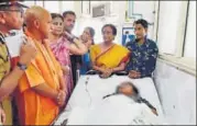  ?? HT PHOTO ?? Chief minister Aditya Nath and minister Rita Bahuguna Joshi with the acid attack victim at KGMU in Lucknow on Friday.