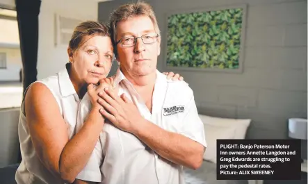  ??  ?? PLIGHT: Banjo Paterson Motor Inn owners Annette Langdon and Greg Edwards are struggling to pay the pedestal rates.
Picture: ALIX SWEENEY