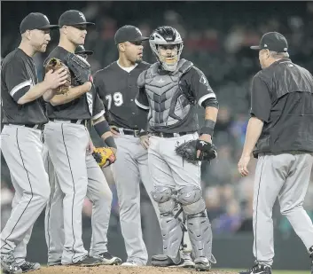  ?? STEPHEN BRASHEAR/GETTY IMAGES ?? Limiting the number of visits to the mound by catchers is just one of several proposals being discussed in an attempt to quicken the pace of MLB play. Other measures include a pitch clock and restoring the lower edge of the strike zone from just...