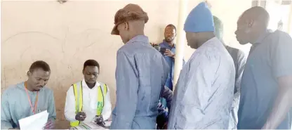  ?? ?? Voters being accredited at a polling unit at Shehuri Ward of Maiduguri during the local government election in Borno State on Saturday. PHOTO: