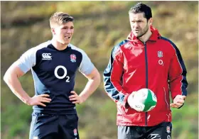  ??  ?? Formidable: Owen Farrell and father Andy (right) during England training in 2013