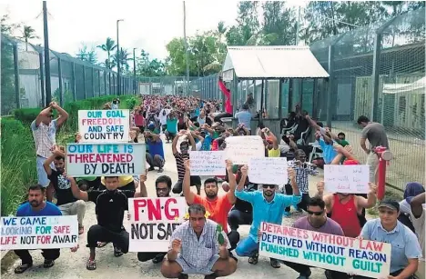  ?? Picture / AP ?? Asylum seekers protest at the Manus Island immigratio­n detention centre, which an Australian court has ordered to be closed.