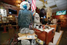  ?? John Bazemore / Associated Press ?? Items donated by the family of Yeti researcher Tom Slick on display at Expedition: Bigfoot! The Sasquatch Museum in Cherry Log, Ga.