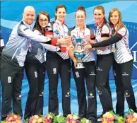  ?? PROVIDED TO CHINA DAILY ?? Team Canada won 13 straight games to capture the World Women’s Curling Championsh­ip in Beijing on Sunday. The victory was the 16th time Canada has won the event.