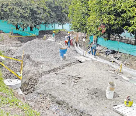  ?? CORTESÍA INDER ?? La pista de atletismo de la Unidad Deportiva de Belén y el gimnasio al aire libre son los primeros espacios que se están mejorando.