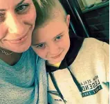  ?? PHOTO: SUPPLIED ?? Justin Reid, 8, who died after falling through a roof, with his mum Angela Reid.