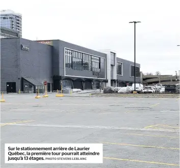  ?? PHOTO STEVENS LEBLANC ?? Sur le stationnem­ent arrière de Laurier Québec, la première tour pourrait atteindre jusqu’à 13 étages.