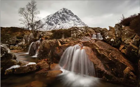  ??  ?? „ Buachaille Etive Mor and this waterfall on River Coupall are seen from Glen Etive, but there are claims hydro dam schemes could scar the area’s beauty.