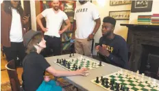  ?? Courtesy of Bryan Quick ?? Above left: Jaylen Brown plays chess against 9-year-old Nico Chasin, the national champion for his age group, in New York. Top and bottom right: Brown was last season’s Pac-12 Freshman of the Year for Cal.