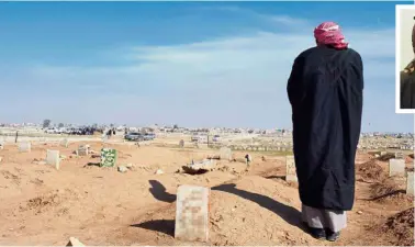  ??  ?? Grieving father: Abu standing by Atheer’s (inset) grave in Gogjali cemetery in eastern Mosul. — Reuters