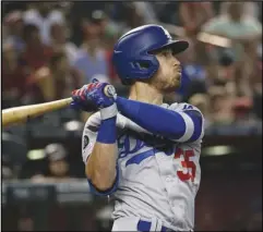  ?? Associated Press ?? BIG DEAL — The Dodgers’ Cody Bellinger agreed Friday to an $11.5 million, one-year contract with the Dodgers, the largest salary for a player eligible for arbitratio­n for the first time.