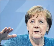  ?? FOTO: MICHAEL KAPPELER/DPA ?? Bundeskanz­lerin Angela Merkel (CDU) hat die Hoffnungen auf einen normalen Sommerurla­ub gedämpft.