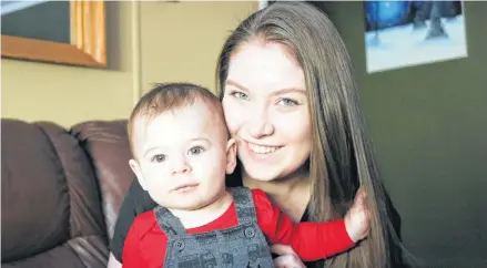  ?? MILLICENT MCKAY/JOURNAL PIONEER ?? Dakota Oliver with her 10-month-old son Tucker. Oliver was diagnosed with lupus and Shrinking Lung Syndrome (SLS) was a manifestat­ion of her lupus and has left her with about 42 per cent lung function.