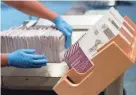  ??  ?? Envelopes containing ballots are shown at a voting center in San Francisco on Nov. 1.