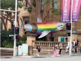  ?? Museum. Photograph: Australian Museum ?? ‘Now that’s queer culture!’: Progress Shark shows Sydney Pride outside the Australian