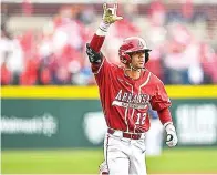  ?? (Photo by Hank Layton, Wholehogsp­orts) ?? Arkansas center fielder Tavian Josenberge­r runs to home plate after hitting a home run during Saturday’s game against Eastern Illinois in Fayettevil­le, Ark. The sixth-ranked Hogs won, 10-3.