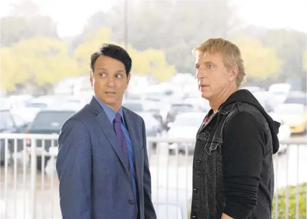  ?? CURTIS BONDS BAKER/NETFLIX ?? Ralph Macchio, left, and William Zabka in “Cobra Kai.” Netflix picked up the YouTube Premium series last year.