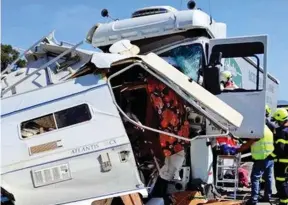  ??  ?? Wreckage: The campervan after its collision with the lorry