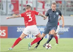 ?? EPA ?? England’s Harry Kane, right, during the match against Malta on Friday.
