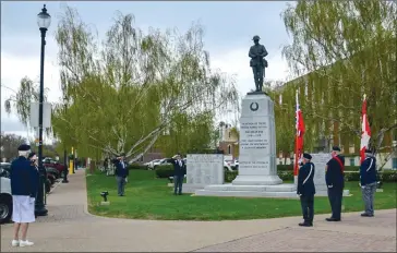  ?? Southern Alberta Newspapers photo by Nikki Jamieson ?? Members of the Royal Canadian Legion General Stewart Branch No. 4, along with representa­tives of other local service organizati­ons, attend a wreath-laying ceremony Friday morning at Lethbridge Cenotaph to commemorat­e the 75th anniversar­y of the end of Second World War in Europe.