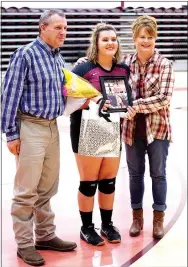  ?? Photo by Randy Moll ?? Audra Weathers, with her parents, Mark and Jerri, were honored at senior night in Gentry on Oct. 13.