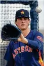  ?? KarenWarre­n / Staff photograph­er ?? Astros pitcher Forrest Whitley is the team’s top overall prospect.