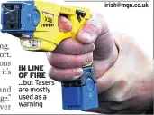  ??  ?? IN LINE OF FIRE ...but Tasers are mostly used as a warning