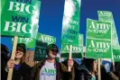  ?? Photograph: Kerem Yucel/AFP via Getty Images ?? Supporters of Amy Kobluchar demonstrat­e at the Drake University campus in Des Moines on Tuesday, before the debate.