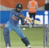  ?? Pawan Singh and Chris Whiteoak / The National; AFP ?? Anti-clockwise from top: India proved again that they are a formidable unit in the one-day internatio­nal format; MS Dhoni was cool as ever and Ravindra Jadeja showed good form all round